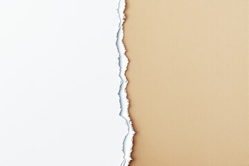 Torn paper revealing contrast between white and brown background.
