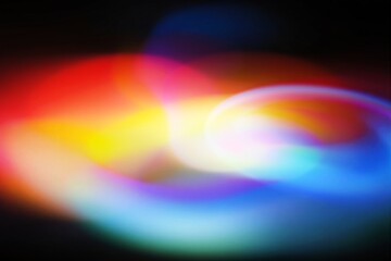 Abstract colorful light background with blurred glowing effects.