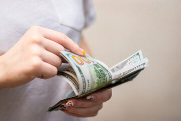 Close-up Hands counting money American dollars , Counting money American dollars with hand ,...