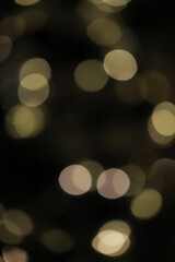 Abstract Golden Bokeh Background with Defocused Light Orbs