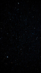 Dark volcanic rock texture background