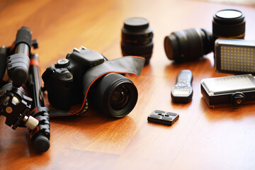 Professional Photography Equipment on Wooden Surface for Photographers