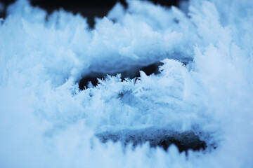 Close-Up of Intricate Frost Patterns on a Cold Winter Morning