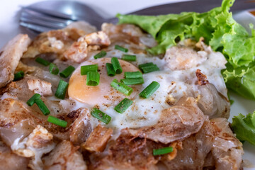 Egg Topped Pad See Ew Noodles with Greens