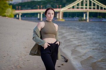 Close-up Fashion woman portrait of young pretty trendy girl posing at beach, stylish pretty...