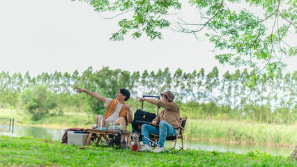 Friends Planning by the Lakeside Camp