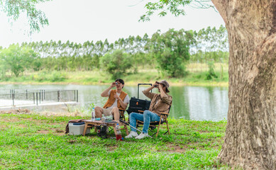 Friends Planning by the Lakeside Camp
