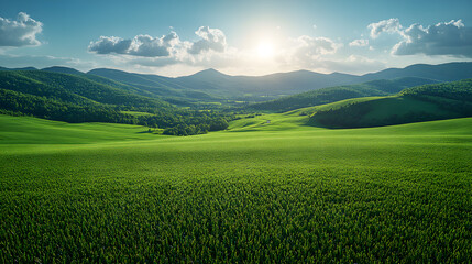 Fototapeta premium Vibrant Green Fields Stretching Towards Rolling Hills Under a Bright Sun