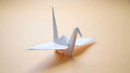 White Origami Crane in Soft Light and Shadows &ndash; Minimalistic Paper Art
