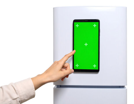 Hand Interacting with Green Screen Smart Fridge Display