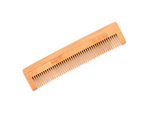 Wooden classic comb, hair brush isolated on white, top view