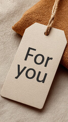 For you gift tag on fabric background with warm tone