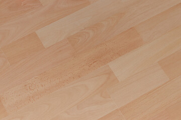 Light wooden floor covering entire surface with copy space