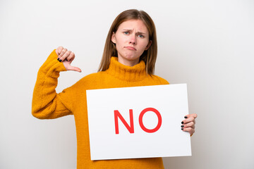 Young English woman isolated on white background holding a placard with text NO and doing bad signal