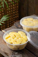 Traditional Malaysian fermented tapioca dessert known as tapai ubi kayu served on a white plate