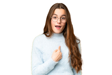 Teenager girl over isolated chroma key background with surprise facial expression