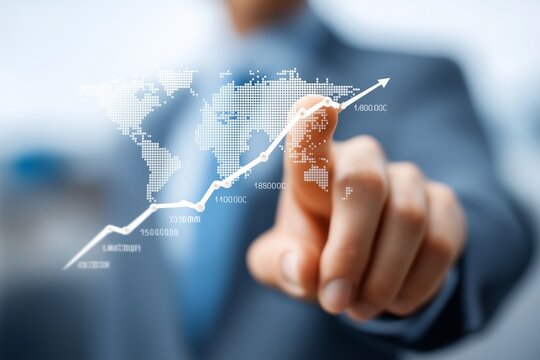 Businessman touching virtual world map with rising financial graph representing global economic growth and data analytics in modern digital business environment