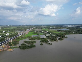 This is the Non Trach Bridge in the final stages of construction. It will join HCMC with Dong Nai and the new Long Thanh Airport