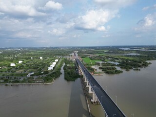 This is the Non Trach Bridge in the final stages of construction. It will join HCMC with Dong Nai and the new Long Thanh Airport