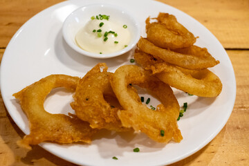Crispy Onion Rings on White Plate
