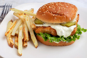cod fish sand  with mayonnaise and pickles