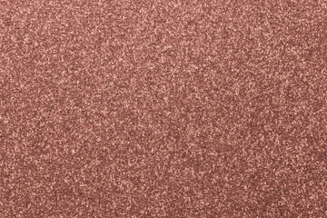 Copper textured glitter card background backdrop. Art and craft hobby supplies concept.