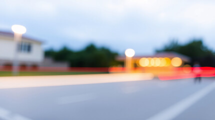 Blurred night street scene with vibrant lights and dynamic motion.