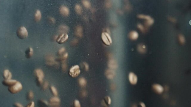 Freshly roasted coffee beans cascading dramatically against deep dark background, revealing intricate texture and dynamic movement of high quality agricultural product
