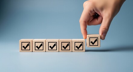 Checklist and task progress tracking concept. A hand placing the final checkmark on wooden blocks in a progress bar, task completion, productivity, goal setting, and efficient project management. 
