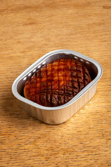 baked bavarian leberkaese on light wood