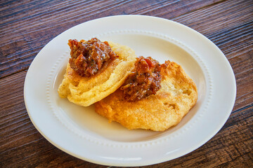 onion fritter topped with caramelized onions