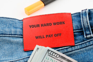 Concept of building success foundation. Text YOUR HARD WORK WILL PAY OFF
