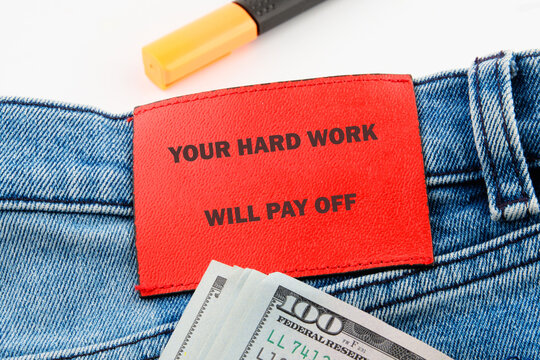Naklejki Concept of building success foundation. Text YOUR HARD WORK WILL PAY OFF