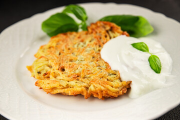 Potato pancakes drainiki potato cutlets vegetable dish fresh delicious gourmet food background on the table rustic food top view copy space vegan and vegetarian food