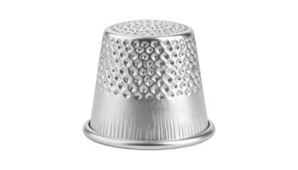 Silver thimble isolated on black background