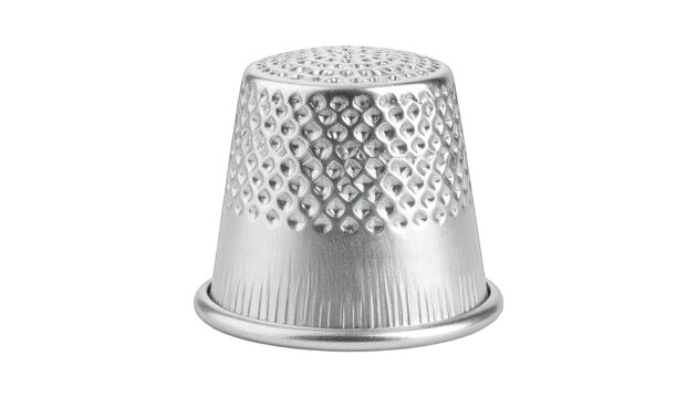 Silver thimble isolated on black background