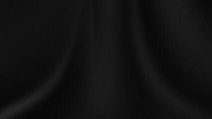 piece of black fabric with a fine texture and wrinkles or folds that create shadow and highlight effects