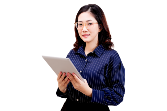 Asian confident young beautiful woman wearing glasses and a striped shirt holds a tablet, looking ahead with a slight smile.