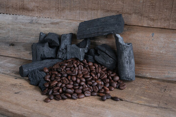 Coffee beans on a wooden background