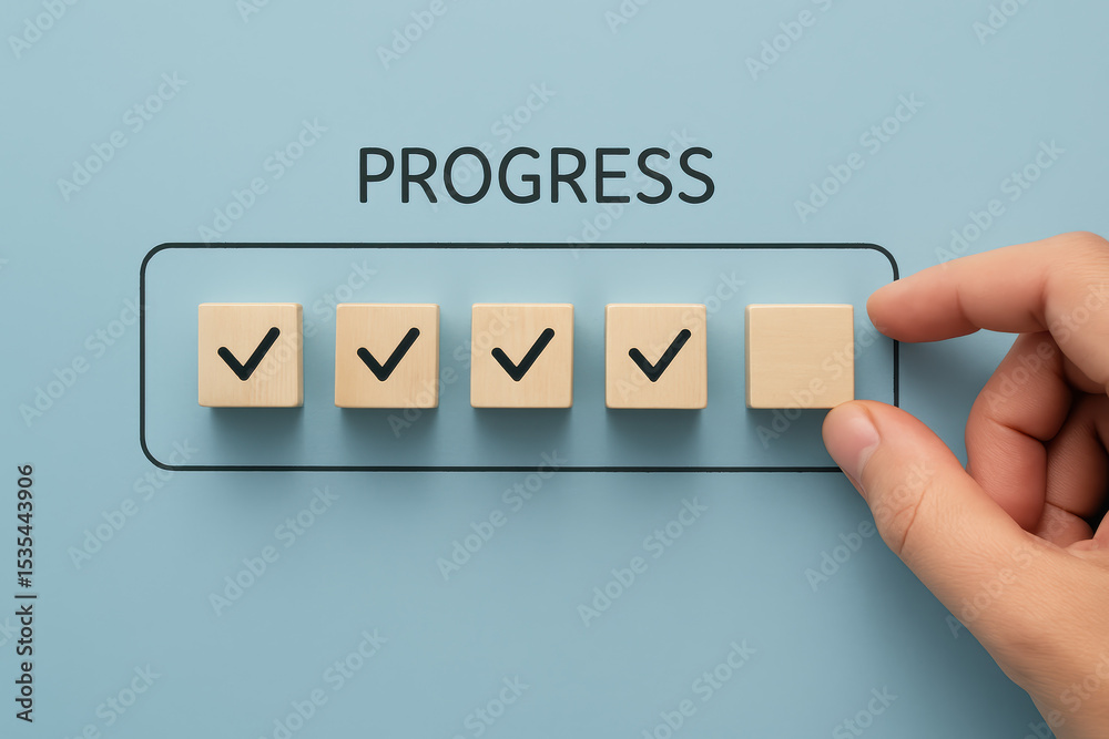 Poster a places the final wooden block in a series check marks symbolizing steady progress and task complet