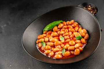Bean stew tomato sauce cranberry beans vegetable dish beans borlotti fresh delicious gourmet food background on the table rustic food top view copy space keto and paleo diet vegan and vegan food