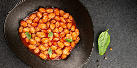 Bean stew tomato sauce cranberry beans vegetable dish beans borlotti fresh delicious gourmet food background on the table rustic food top view copy space keto and paleo diet vegan and vegan food
