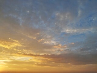 Dramatic sunrise sky view with clouds in summer season 