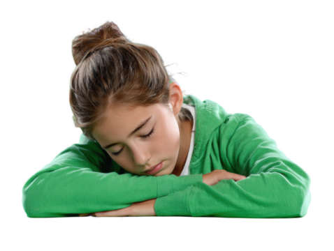 Tiredness and Sleep: Capturing a moment of repose and fatigue, a young individual slumbers peacefully. The scene captures a moment of rest.