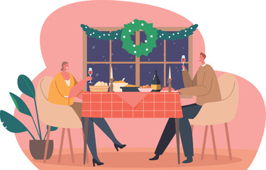 Couple having dinner celebrating Christmas