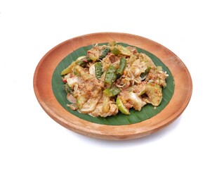 Gado-gado on wooden plate, Indonesian typical food made from vegetables with peanut sauce isolated on white background 