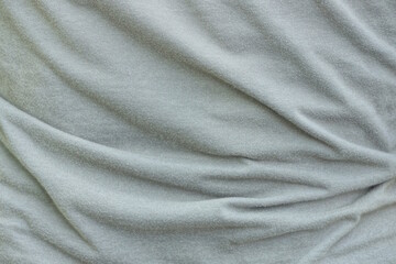 Fototapeta premium gray texture of fabric from a crumpled piece of cloth