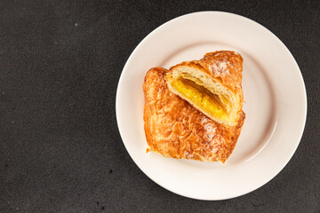 Triangle cake almond puff pastry sweet dessert fresh delicious gourmet food background on the table rustic food top view copy space