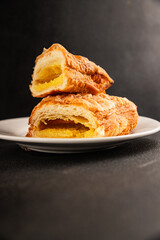 Triangle cake almond puff pastry sweet dessert fresh delicious gourmet food background on the table rustic food top view copy space