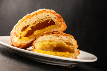 Triangle cake almond puff pastry sweet dessert fresh delicious gourmet food background on the table rustic food top view copy space